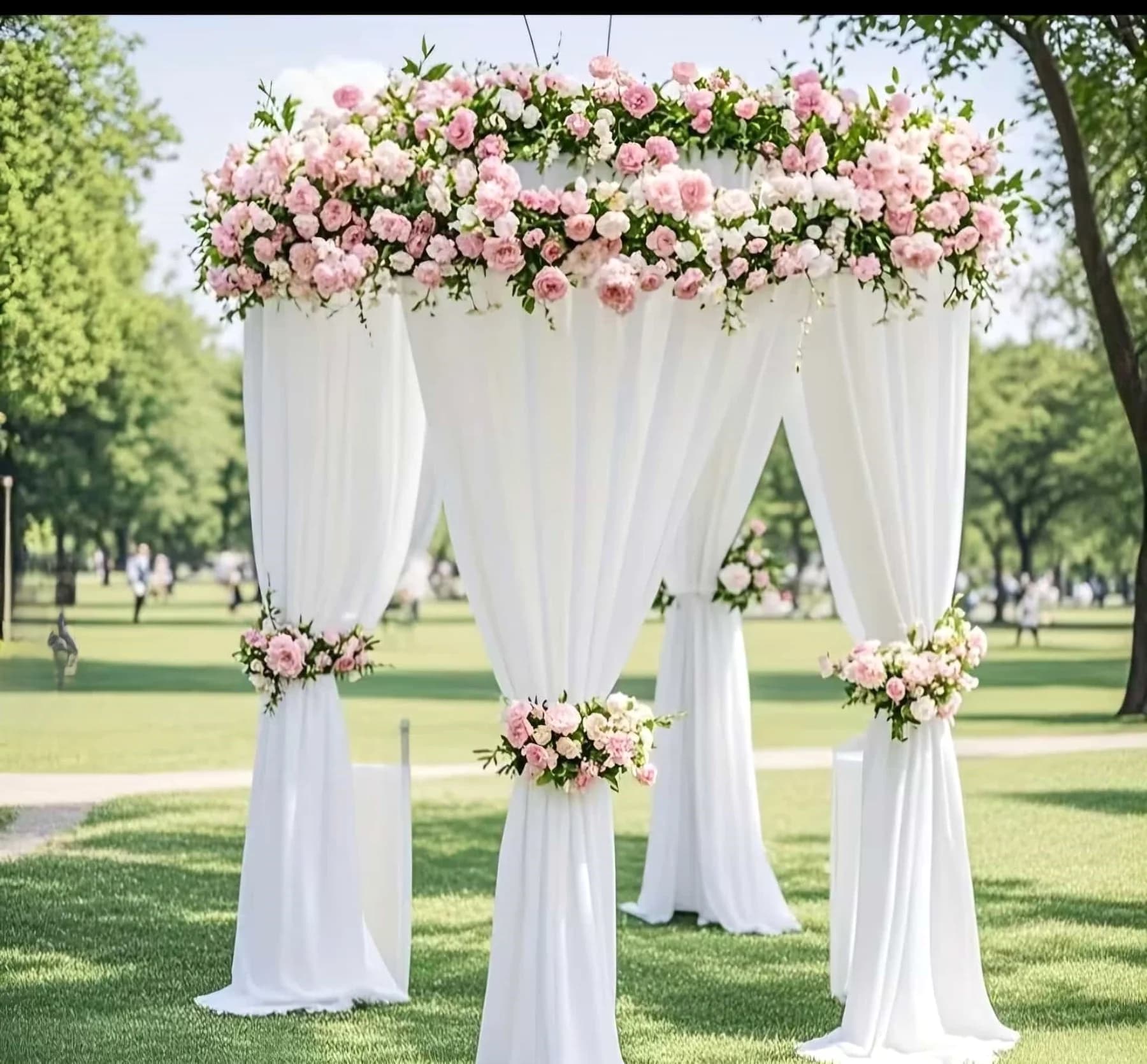 White floral canopy setup for an outdoor ceremony